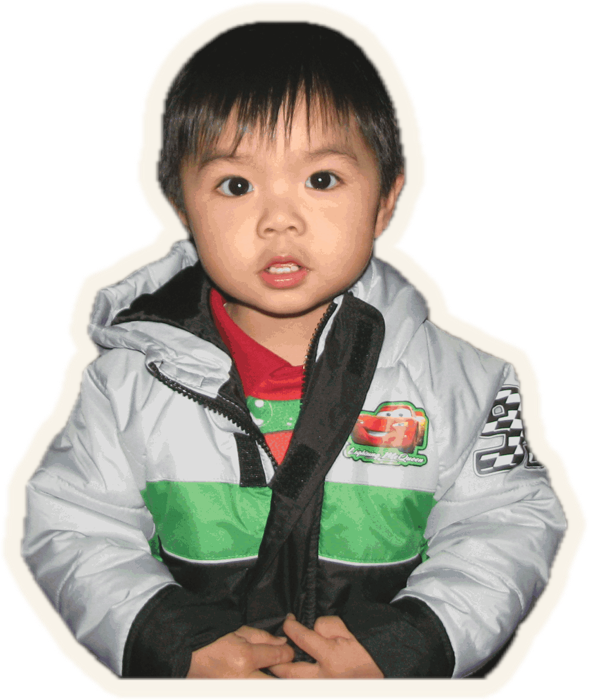 Ben as a toddler in a puffy racing jacket
